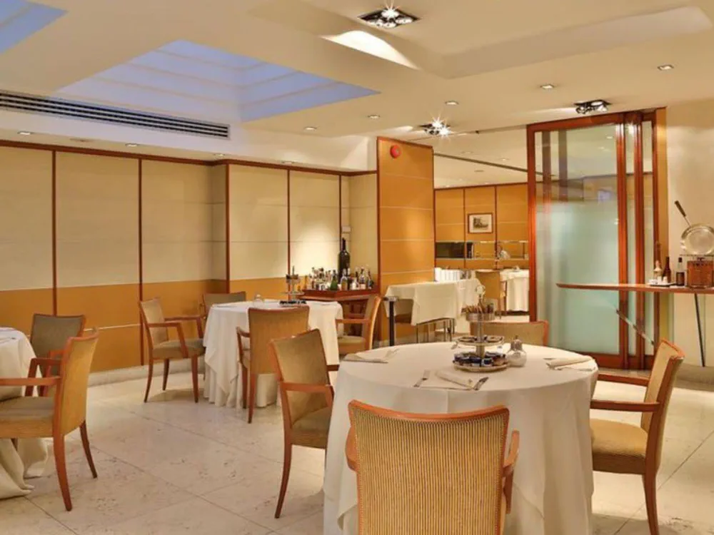 Modern Bauhaus Dining Room with Professional Home Cinema