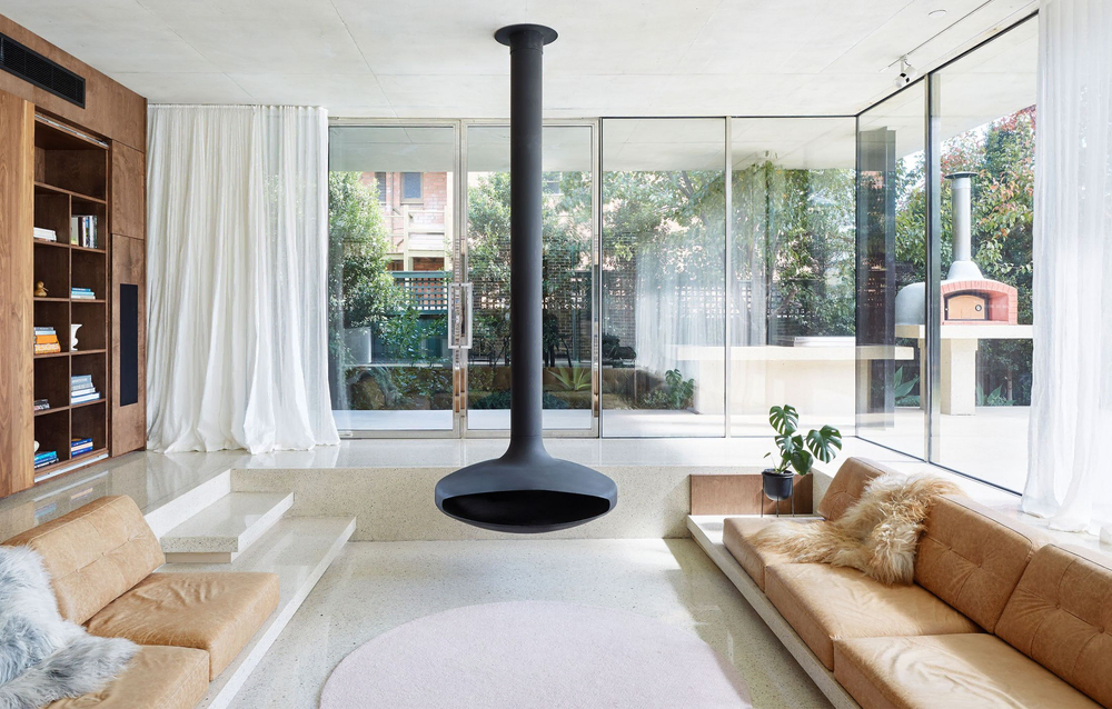 Modern Living Room with Hanging Fireplace