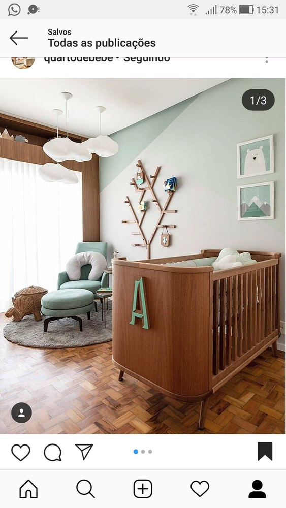 Modern Nursery Design with Colorful Chandelier and Animal-Themed Wall Art