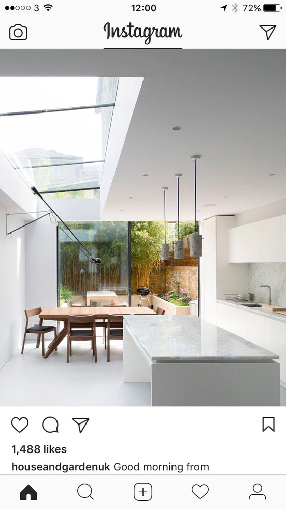 Modern Kitchen Design with Marble Countertop and Glass Skylight