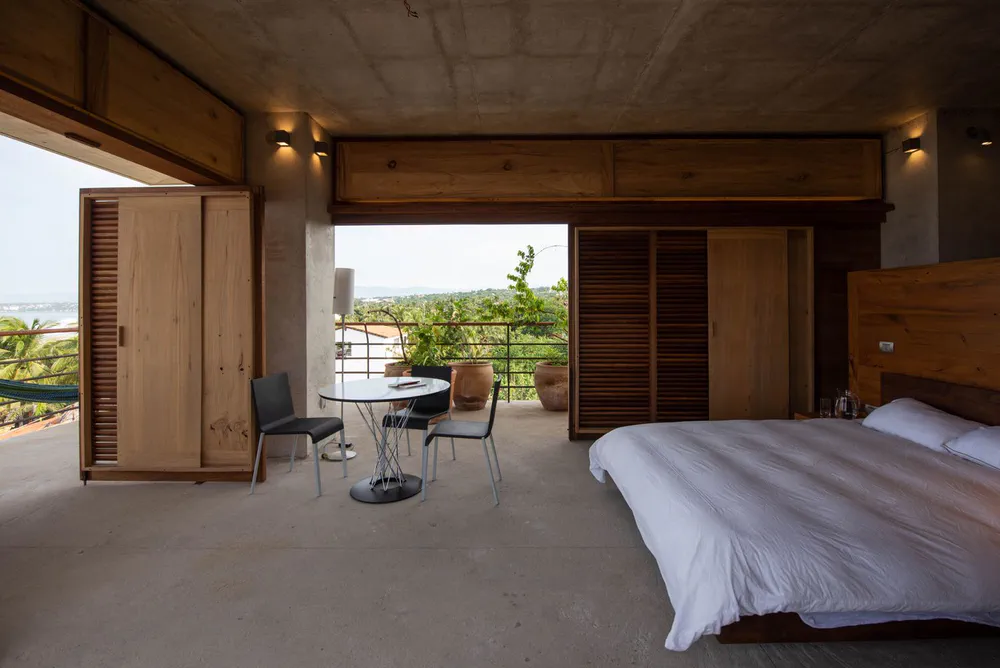 Modern Rustic Bedroom in Coastal Hampton Style Chateau