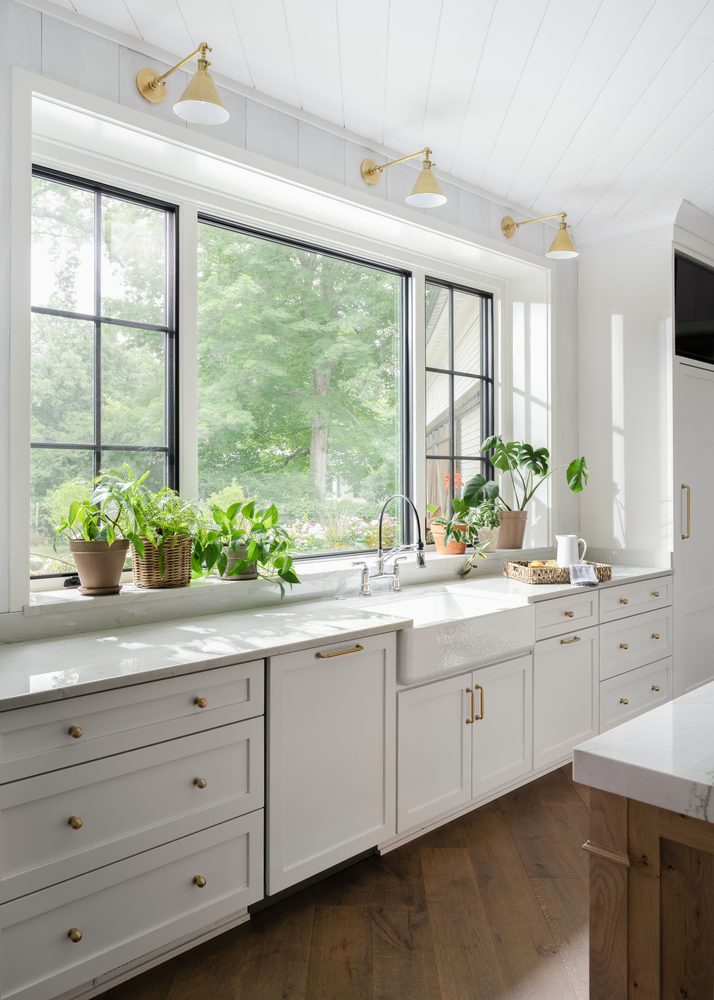 Modern Kitchen Design with White Cabinets and Marble Countertop