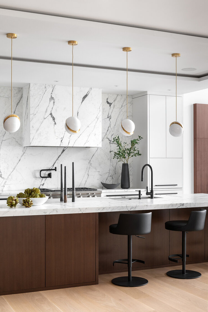 Modern Kitchen Design with White Marble and Black Bar Stools