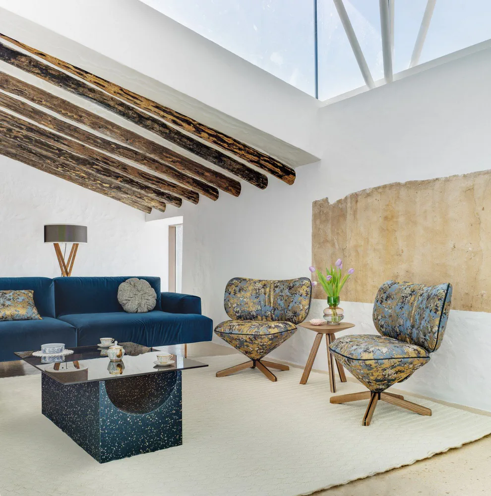 Modern Living Room with Blue Velvet Sofa and Terrazzo Coffee Table