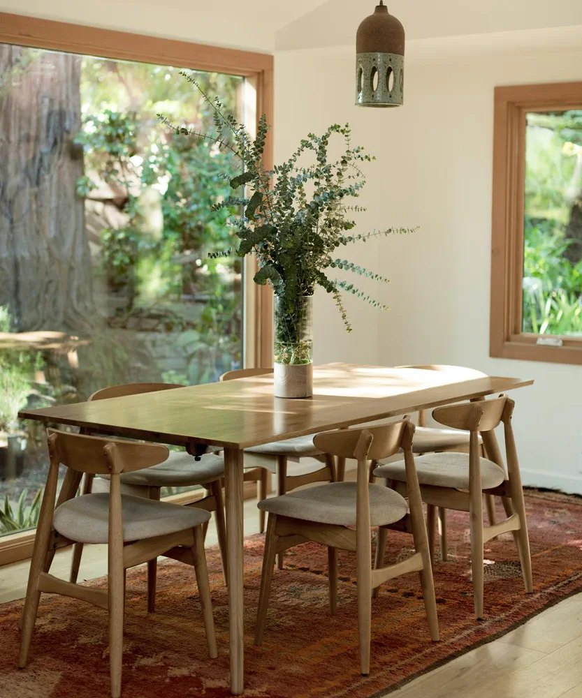 Modern Dining Room Design: Neutral Tones and Textured Wall Hangings