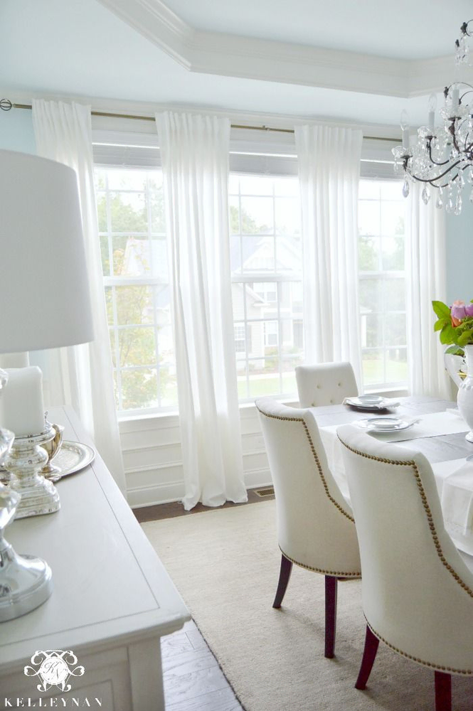 Modern Minimalist Dining Room Design for a Luxury Car Dealership Owner