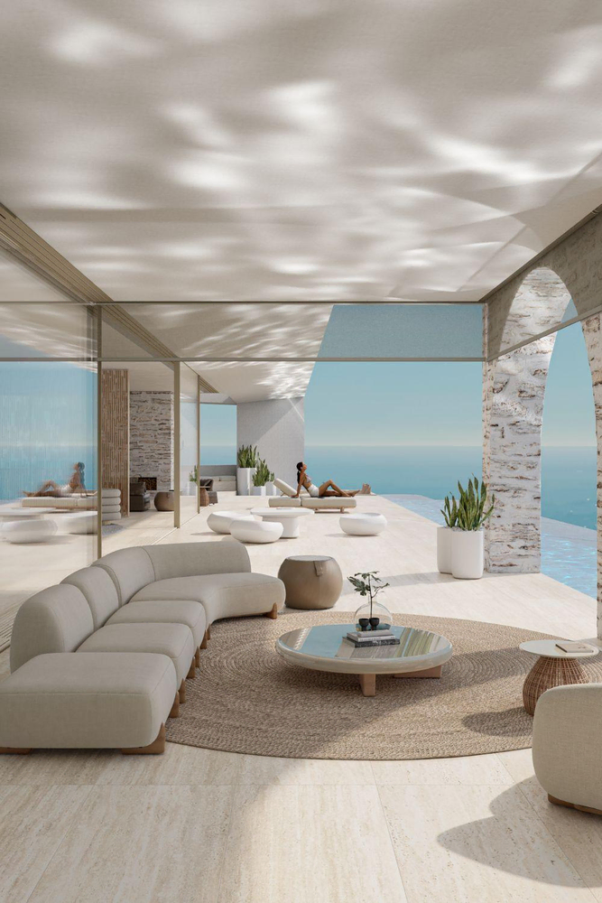 Modern Living Room with Hanging Egg Chairs and Sea View
