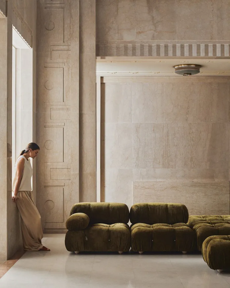 Modern Loft with Concrete Staircase and Green Velvet Sofa