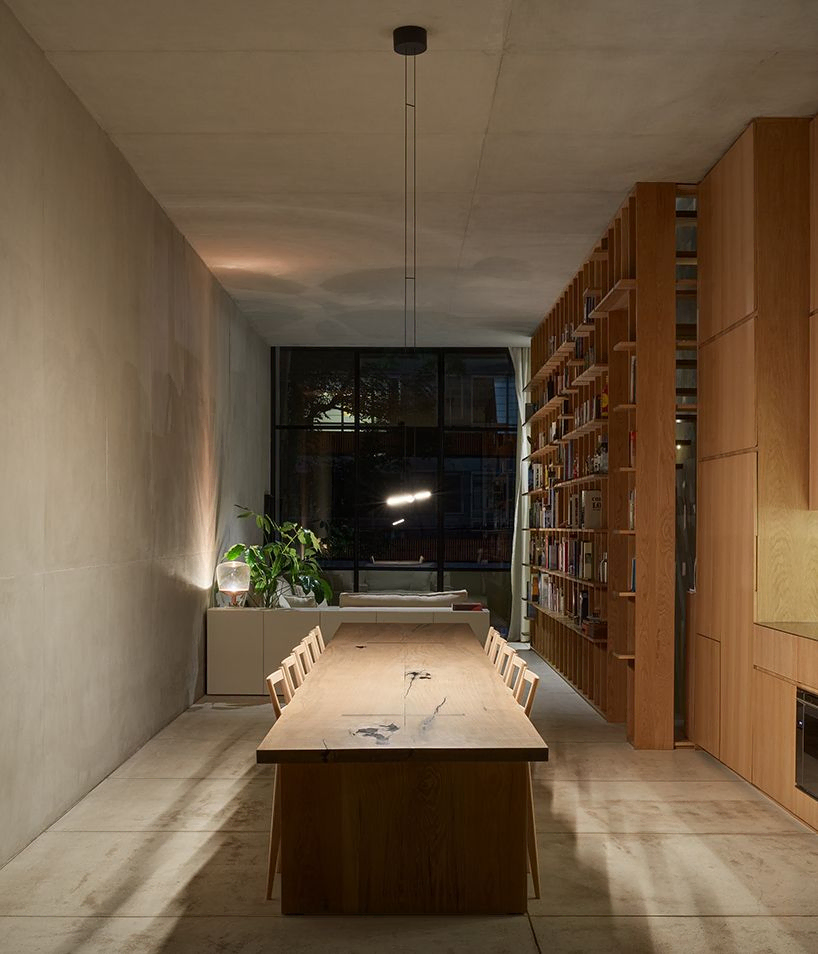 Modern Office Space with Concrete Pendant Lights and Large Windows