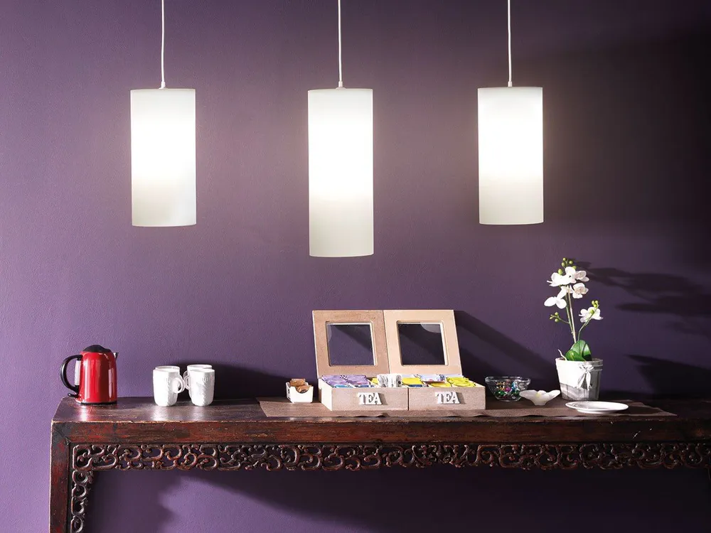 Modern Living Room Design with Purple Walls and White Pendant Lights