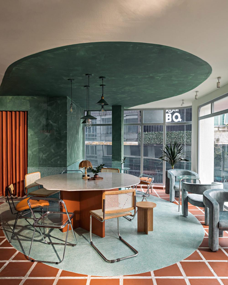 Modern Dining Room with Cane-Backed Chairs and Warm Browns