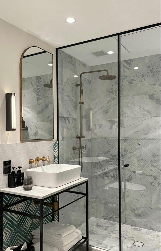 Modern Bathroom Design with Integrated Home Automation and Art Preservation