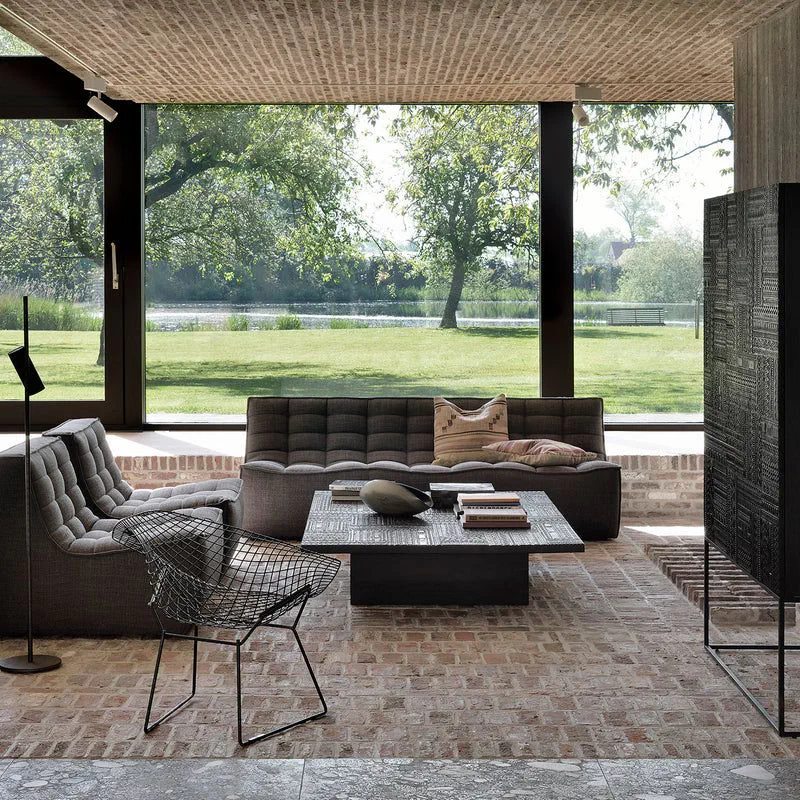 Modern Minimalist Living Room with Concrete Fireplace and City Views