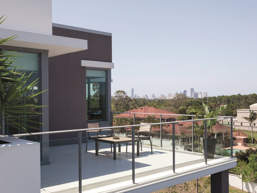 Modern Balcony Design: Sunset View and Comfortable Seating