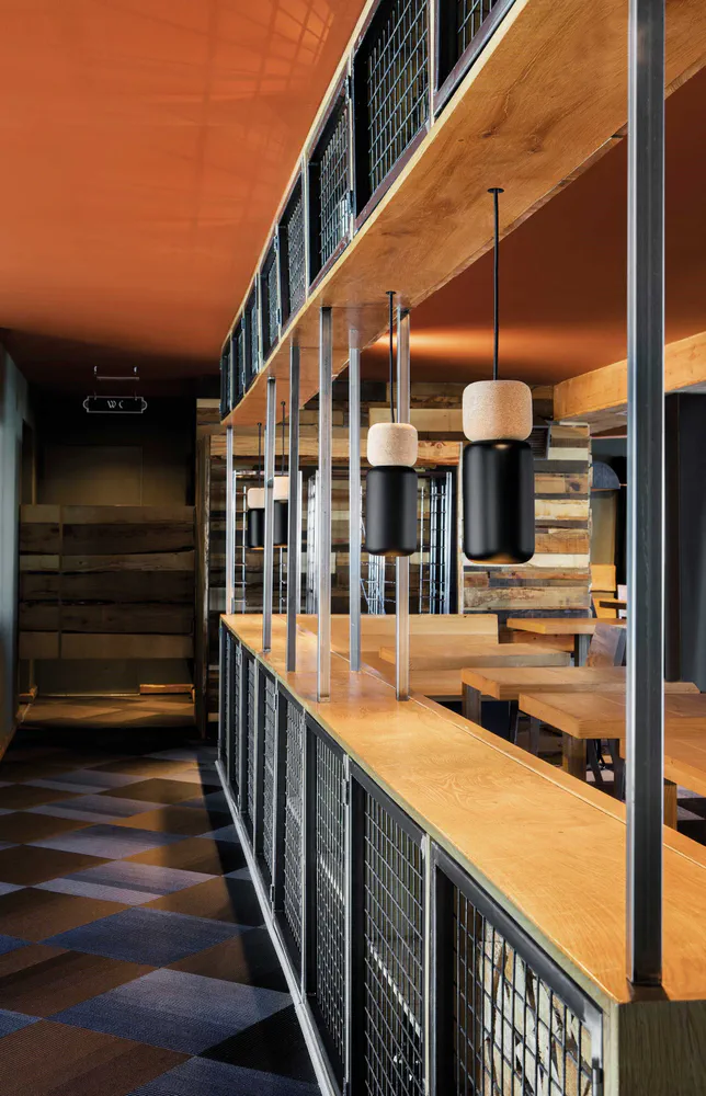 Modern Industrial Cafeteria Design for a Sports Team Owner