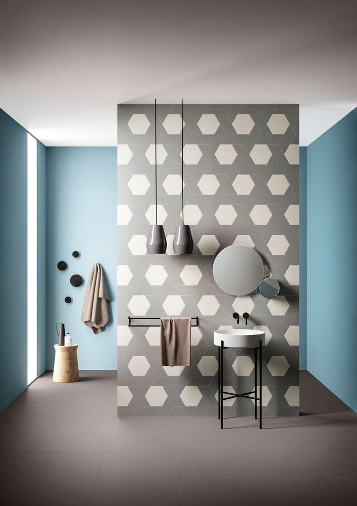 Modern Bathroom Design with Hexagonal Mirrors and Marble Vanity