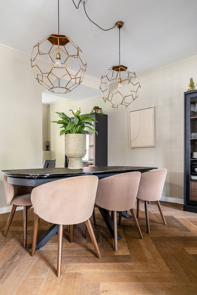 Modern Minimalist Dining Room with Black and Orange Accents