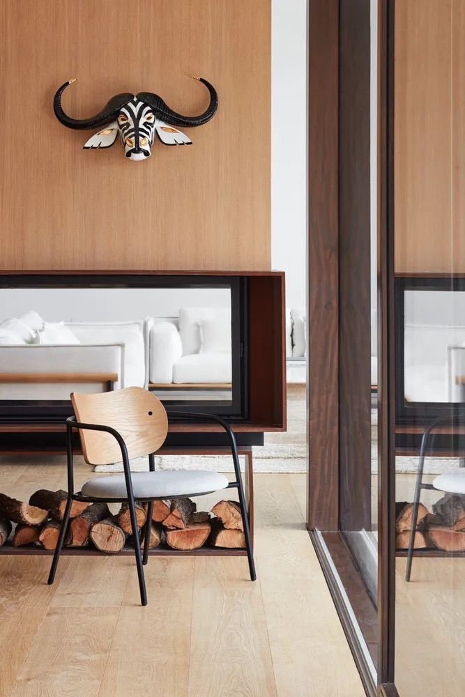 Modern Living Room with Secure Wine Cellar and Firewood Storage