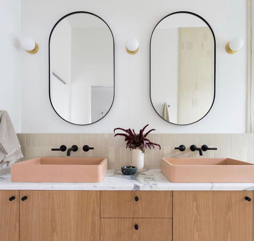 Modern Industrial Bathroom Design: Pale Pink Tiles and Freestanding Tub