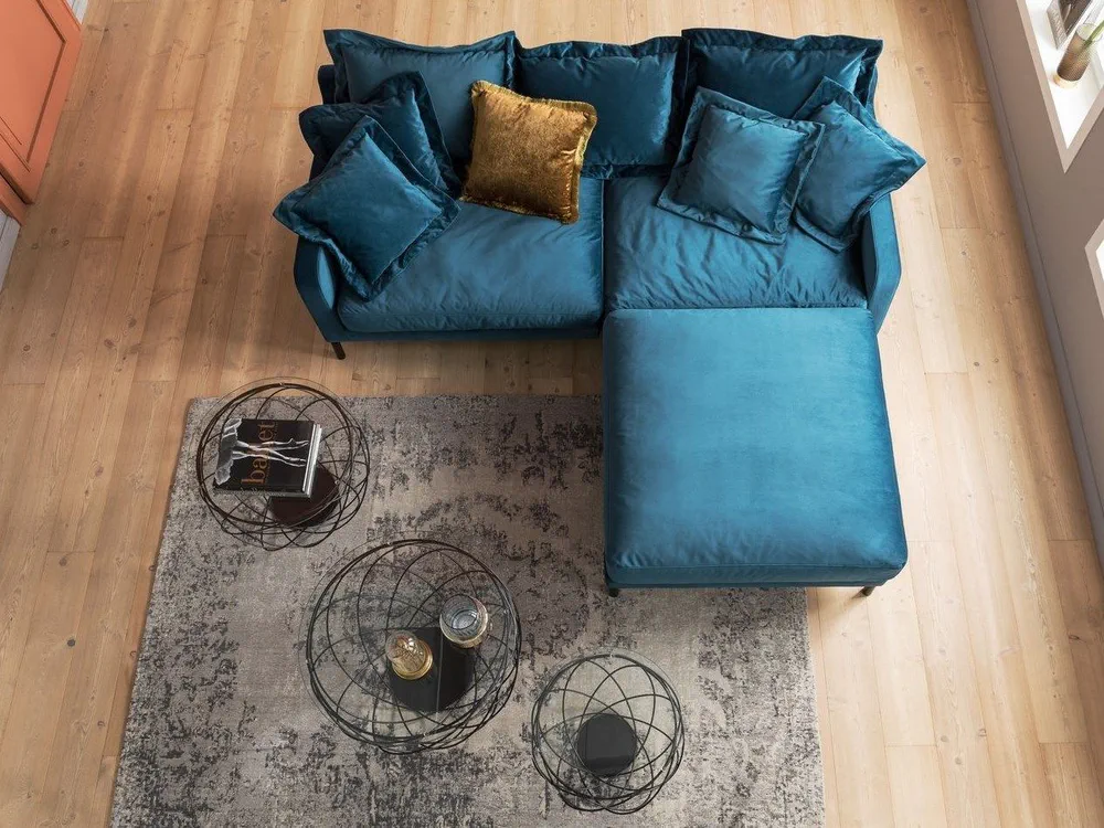 Modern Living Room Design with Blue Velvet Sofa and Wire Coffee Tables