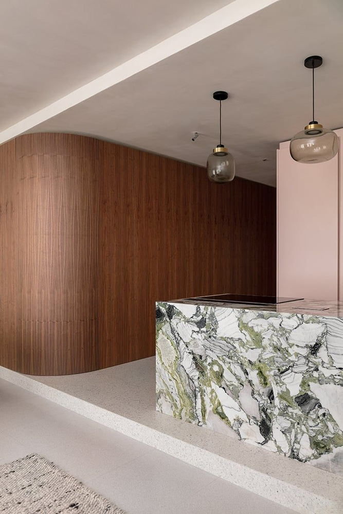 Modern Kitchen Design with Marble Island and Herringbone Flooring