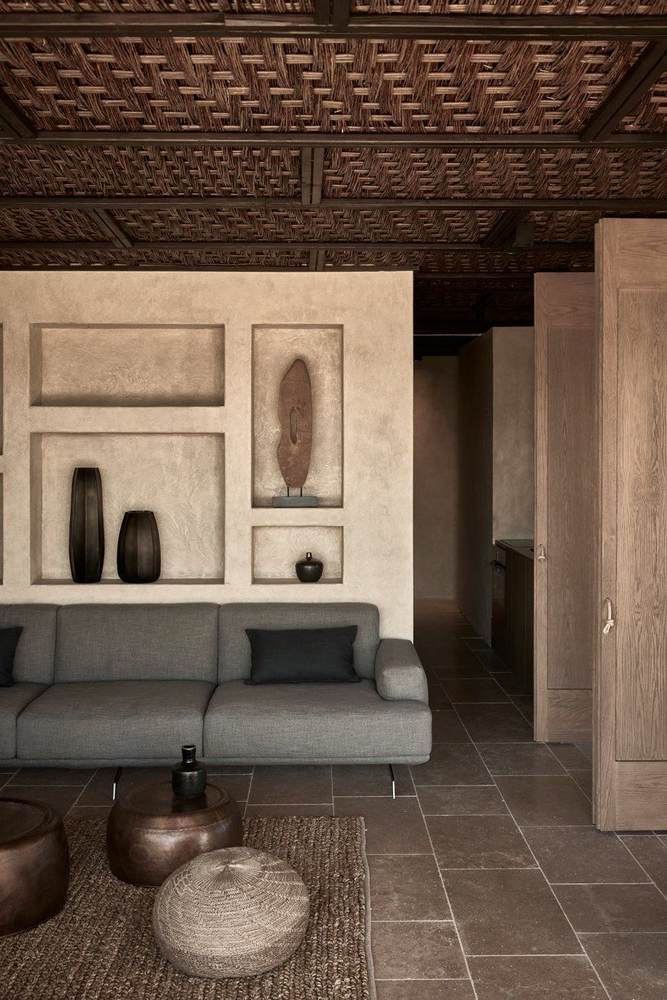 Modern Outdoor Patio Design with Olive Trees and Rustic Accents