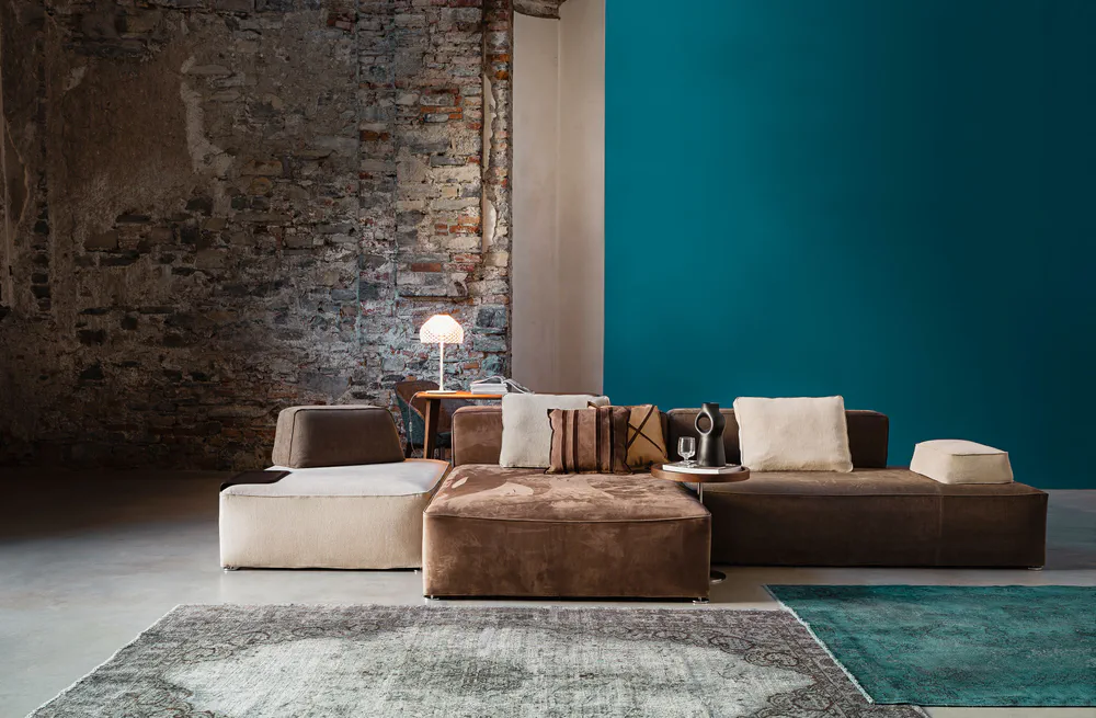 Modern Living Room Design: Teal Accent Wall and Brown Sectional Sofa