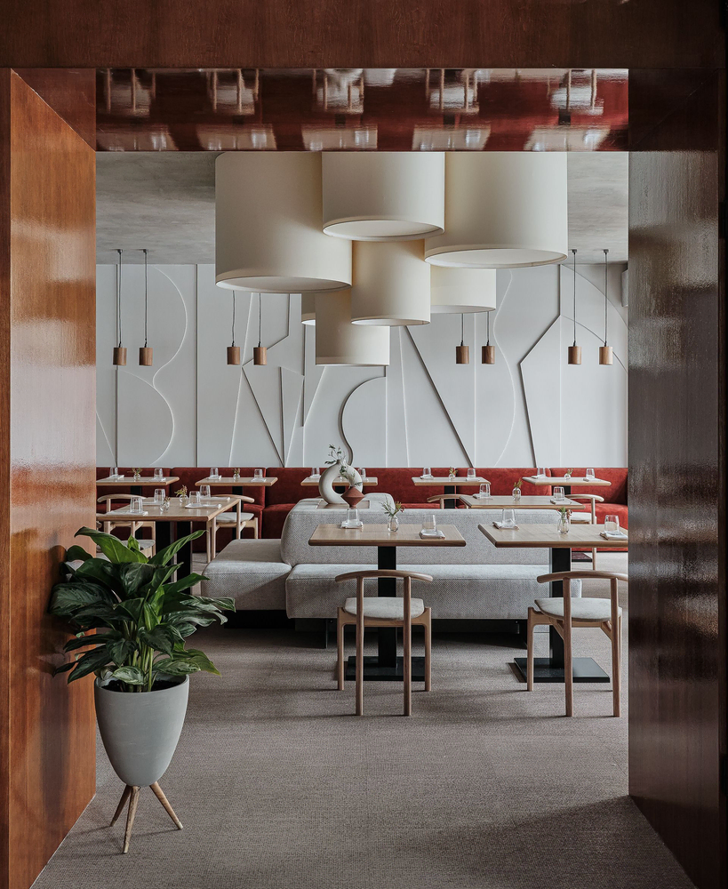 Modern Dining Room with Cane-Backed Chairs and Warm Browns