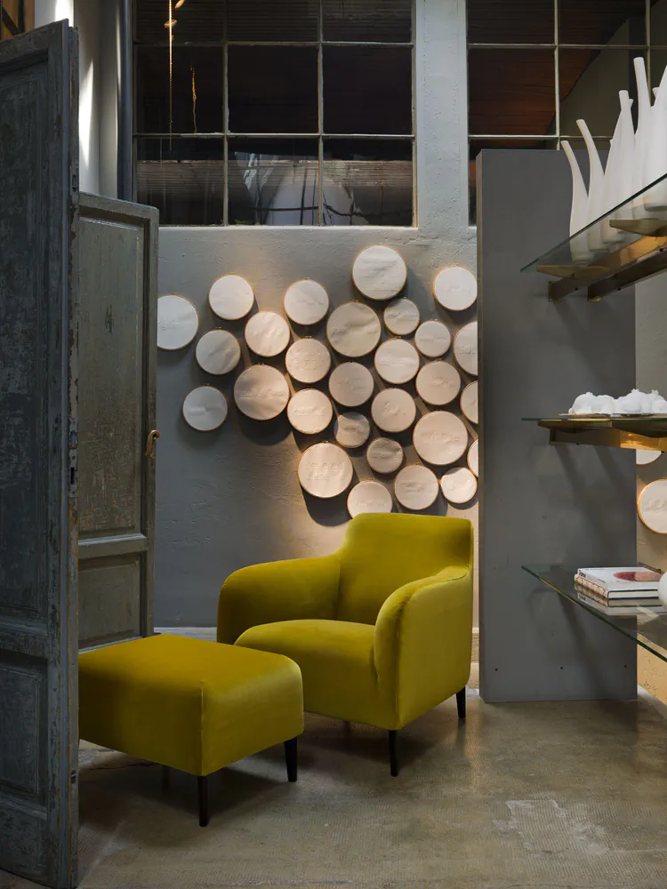 Modern Country Retreat: A Bold Yellow Armchair and Glass Shelves