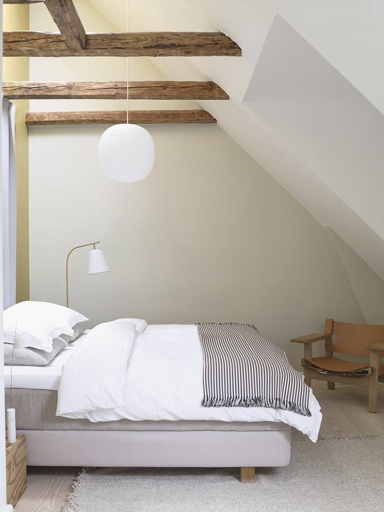 Brutalist Modern Attic Bedroom: Open-Plan Design with Rooftop Terrace
