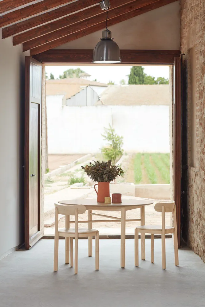 Modern Rustic Dining Room with Hydroponic Garden View