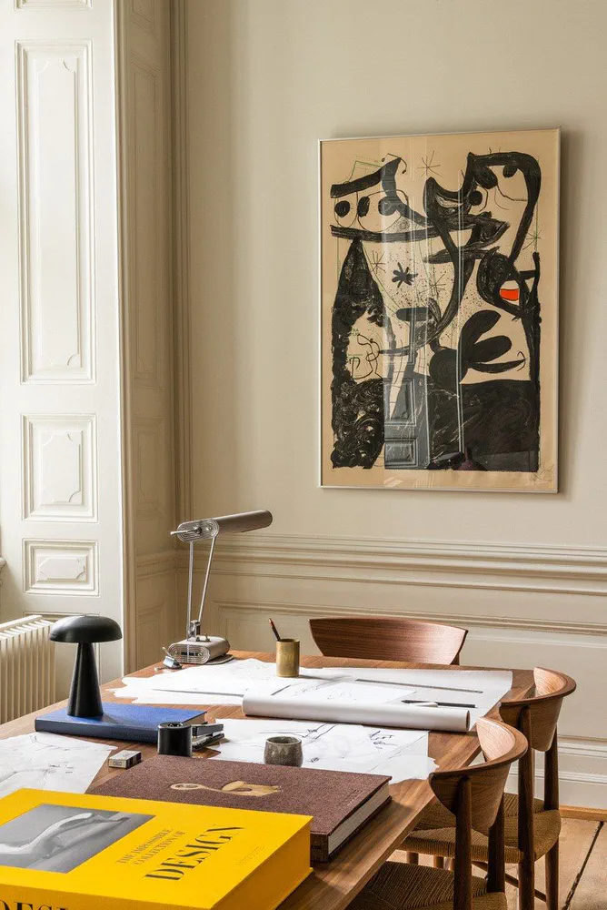 Modern Home Office with Neutral Tones and Abstract Artwork